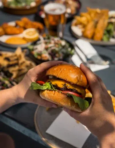 beef pattie, American cheddar, onion jam, tomato, cos lettuce, pickles, mustard mayo, milk bun, chips